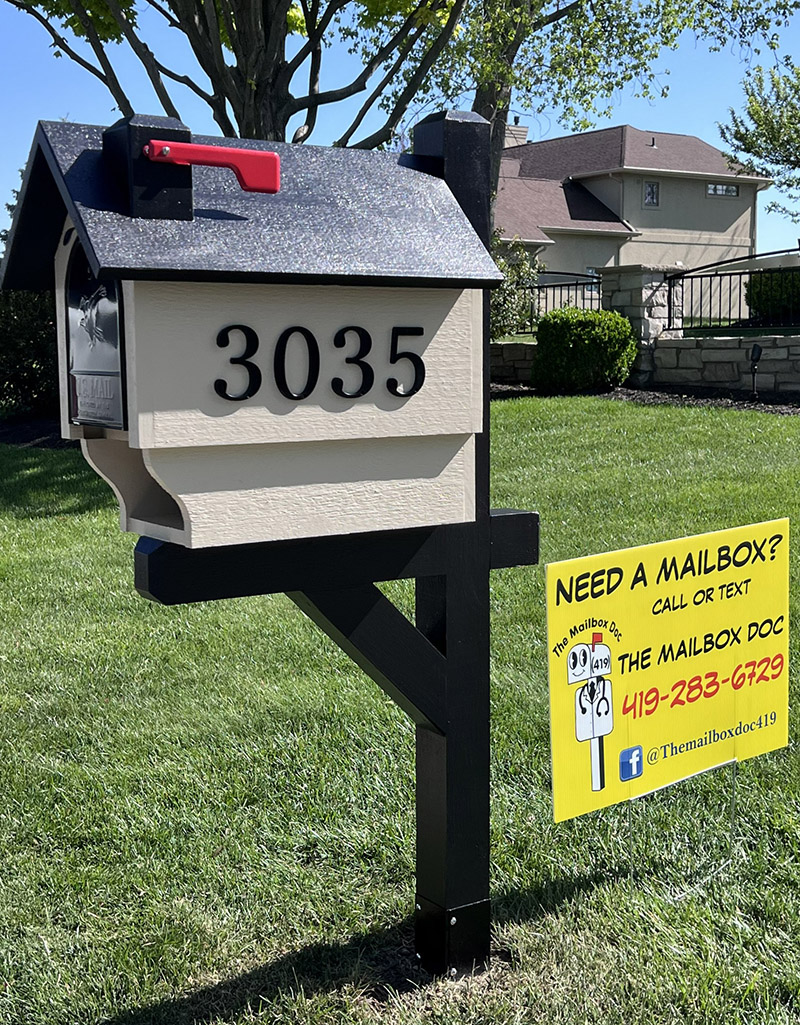 Tan and brown large mailbox